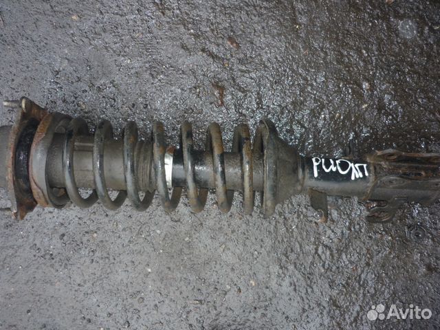 Стойка передняя левая Киа Рио 1