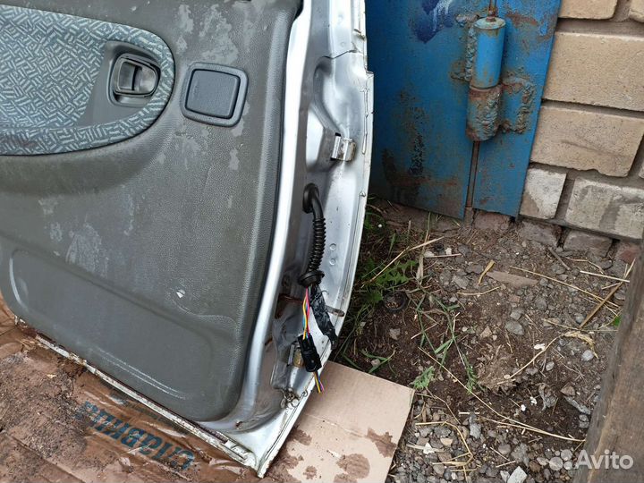 Дверь задняя левая nexia