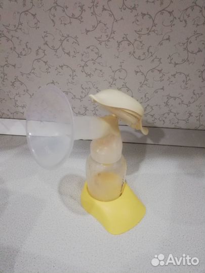 Молокоотсос medela ручной