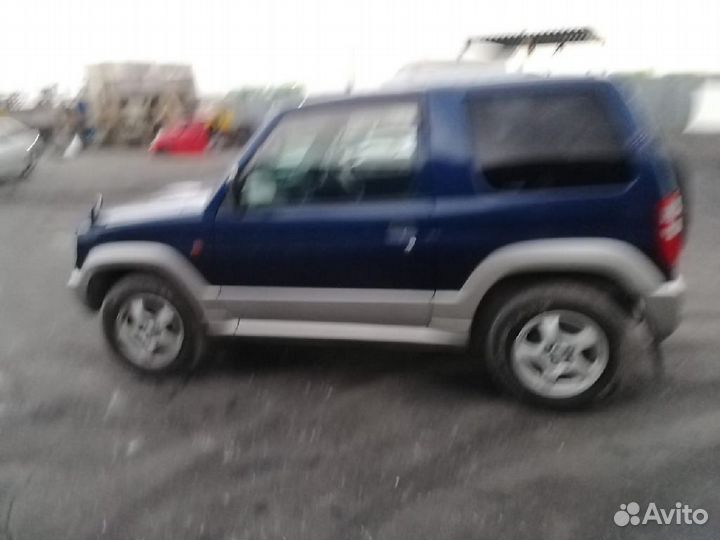 Реактивная тяга передняя левая Mitsubishi Pajero mini H58A