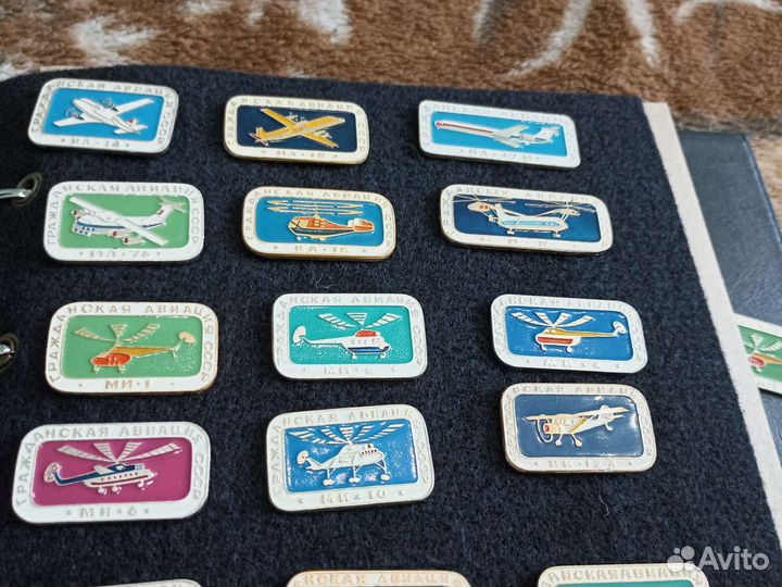 Значки СССР в альбоме