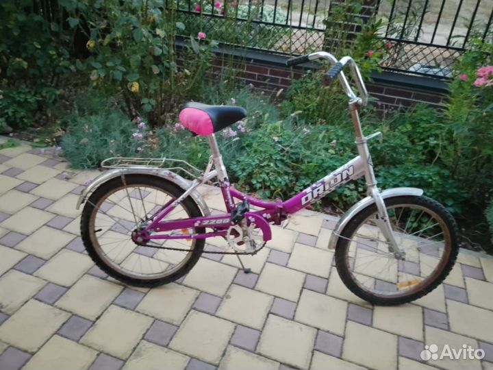 Детский велосипед, младший школьник