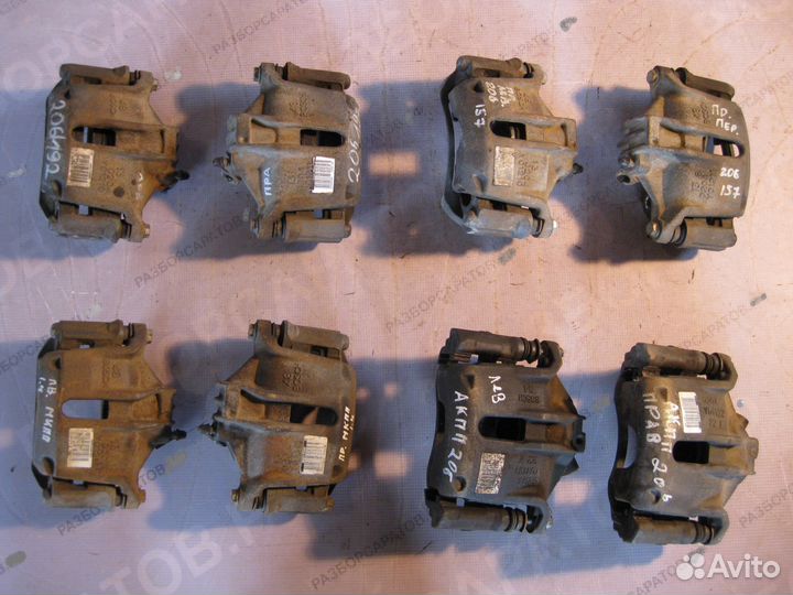 Суппорт тормозной передний Пежо 206 Седан