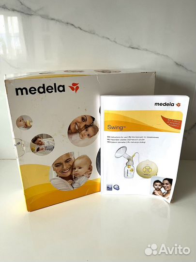Молокоотсос medela swing электрический