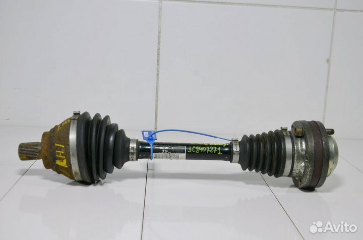 Приводной вал передний левый Volkswagen Passat