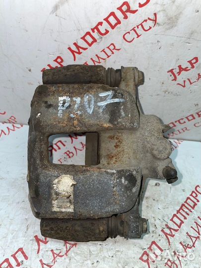 Суппорт тормозной передний левый Peugeot 207 EP6