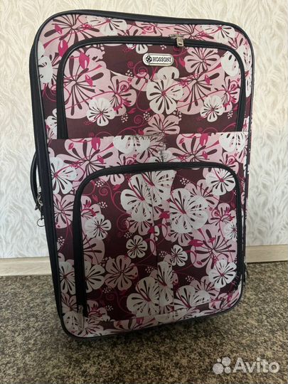 Дорожный чемодан на колесах