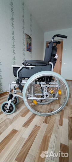Инвалидная коляска новая