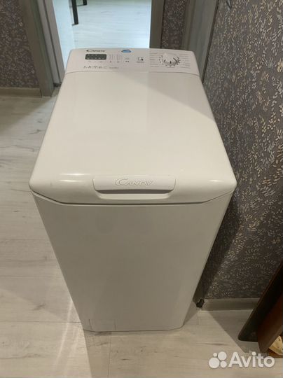 Стиральная машина Candy с вертикальной загрузкой