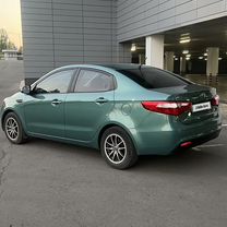 Kia Rio 1.6 AT, 2012, 206 000 км, с пробегом, цена 915 000 руб.