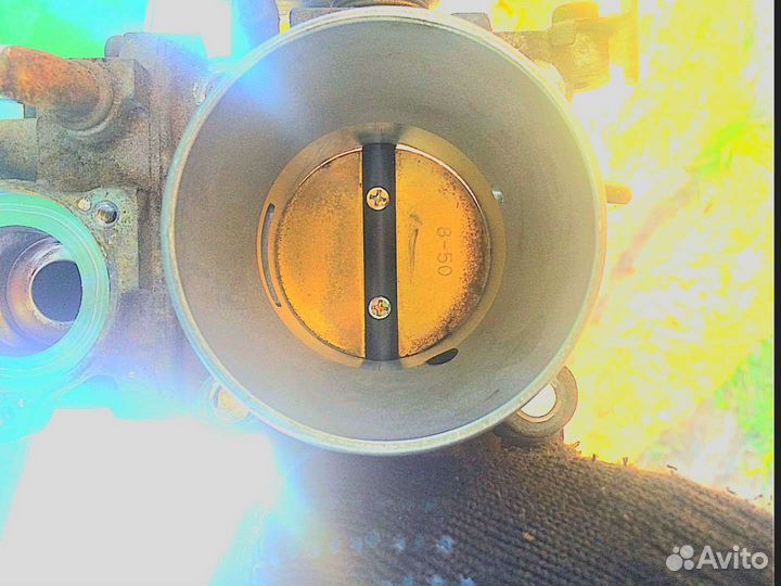 Дроссельная заслонка Лансер 9