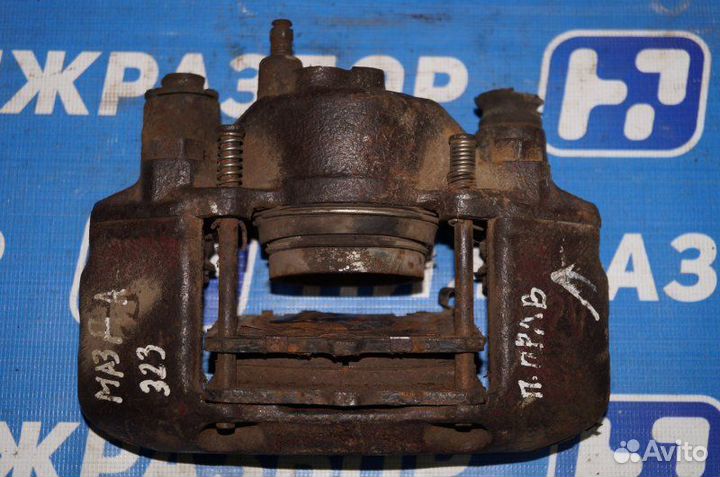 Суппорт передний правый Mazda 323 BG 1989-1994