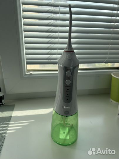 Электрическая зубная щетка