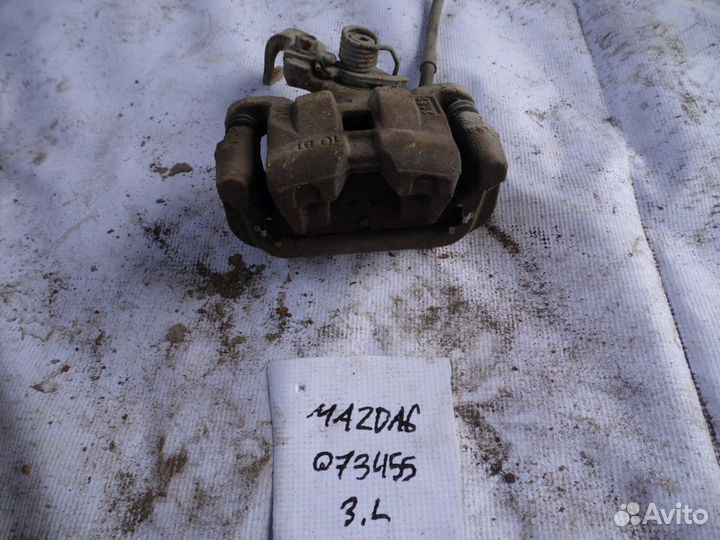 Суппорт тормозной задний левый Mazda Mazda 6 (GH)