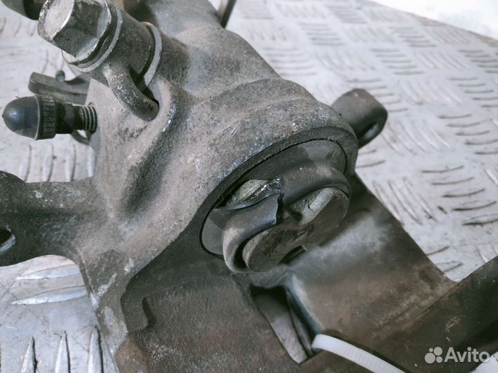 Задний левый суппорт Mazda 6 GG