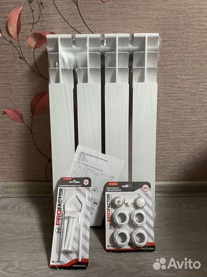 Биметаллический радиатор 4 секции