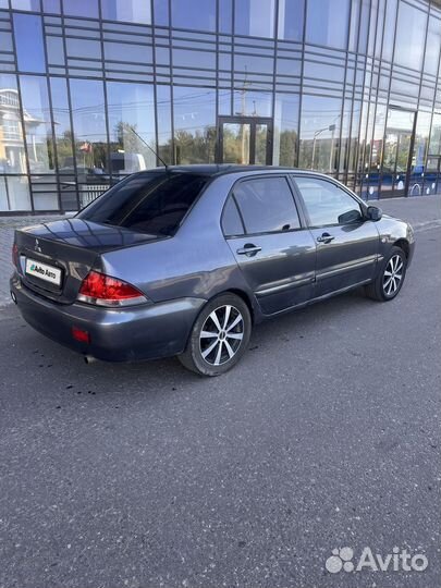 Mitsubishi Lancer 1.6 МТ, 2005, 335 577 км