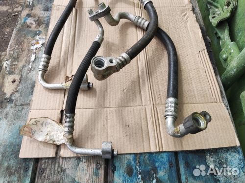 Трубка кондиционера Opel Astra H Zafira B