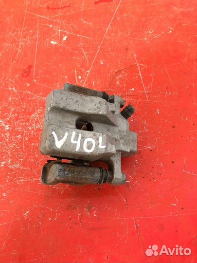 Суппорт тормозной задний левый Toyota Camry XV40