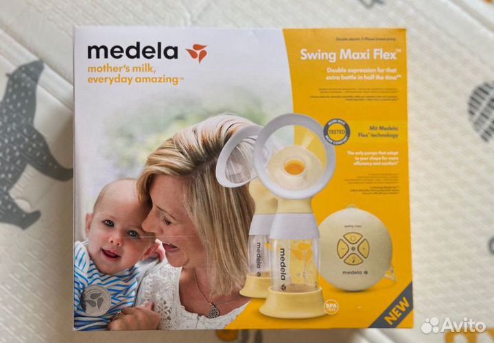 Молокоотсос medela swing maxi flex