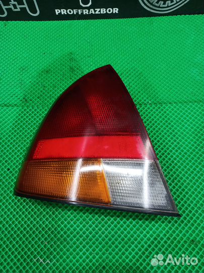 Фонарь задний в крыло левый mitsubishi carisma 199