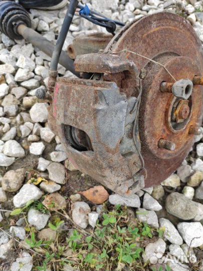 Тормозной суппорт передний левый Ford Fusion