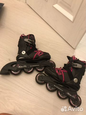 Роликовые коньки