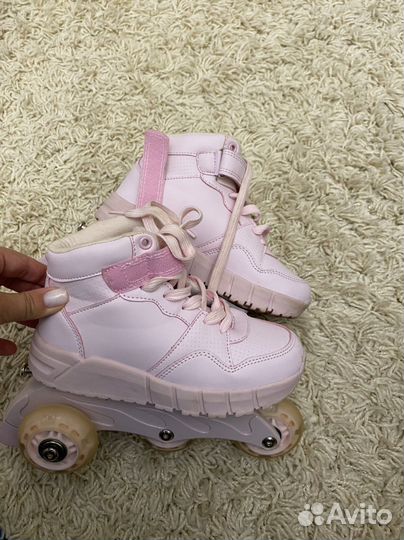 Роликовые коньки