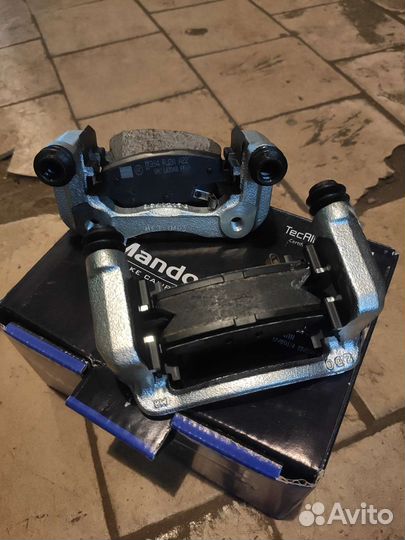 Скоба заднего суппорта solaris kia rio