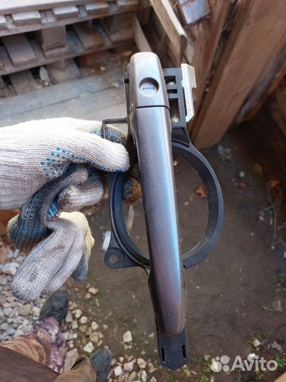 Ручка двери lancer 10