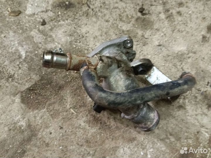 Патрубок гбц охлаждения солярис Рио 3 1.4 G4FA