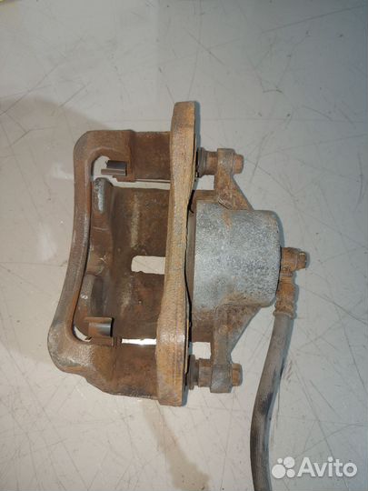 Суппорт тормозной передний правый Kia Sportage 2