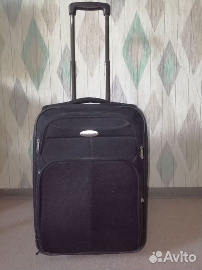 Чемодан Cruiser на колесах