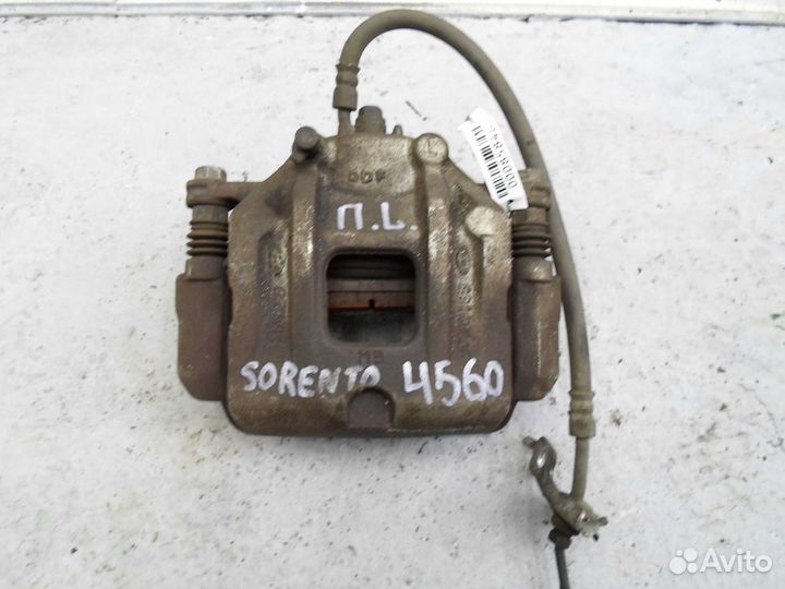 Суппорт передний левый Kia Sorento 2 XM