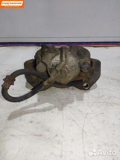 Суппорт тормозной передний левый Opel Astra