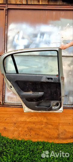 Дверь opel astra g