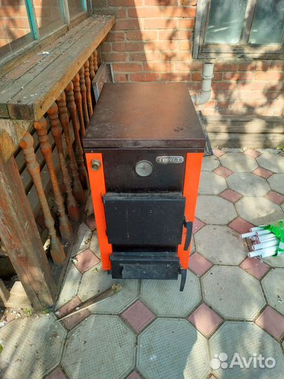 Твердотопливный котел 12.5