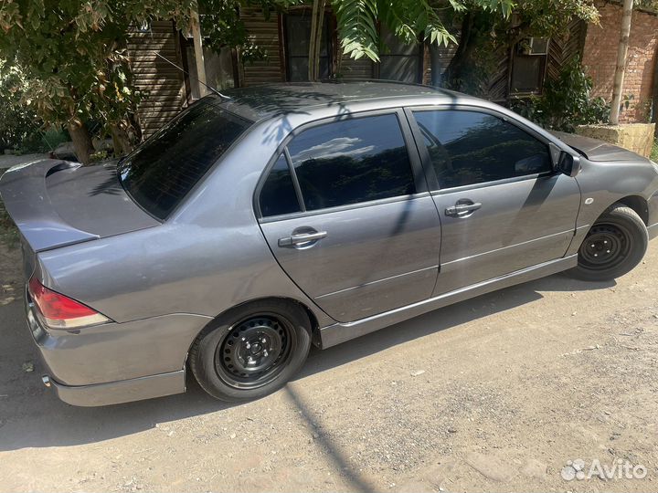 Mitsubishi Lancer 1.6 МТ, 2006, 266 000 км