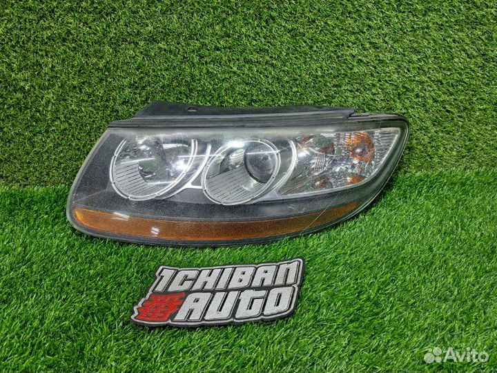 Фара передняя левая Hyundai Santa Fe CM