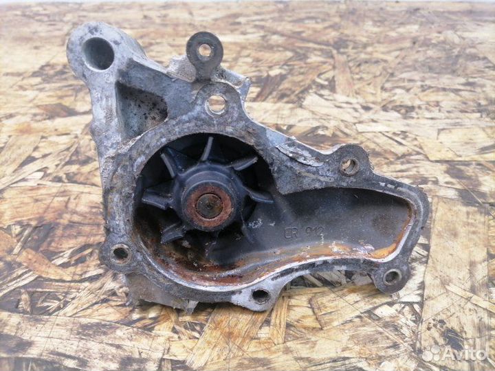 Водяной насос (помпа) Mitsubishi Carisma DA 4G93