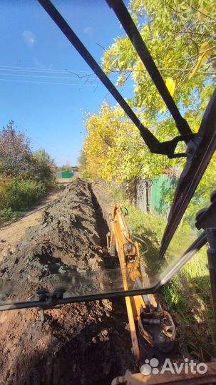 Услуги экскаватора погрузчика