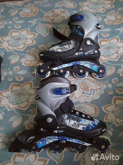 Коньки роликовые