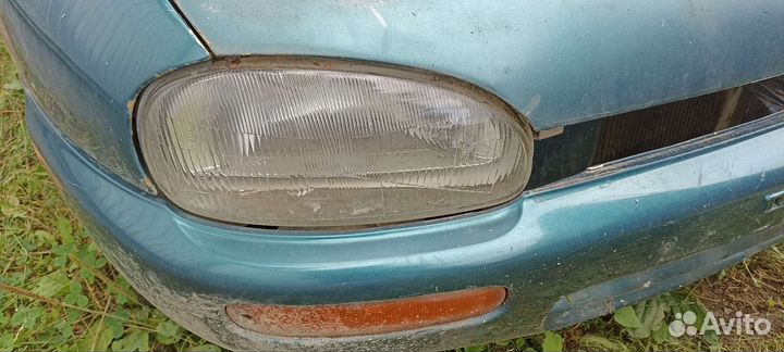 Фара на mazda 121