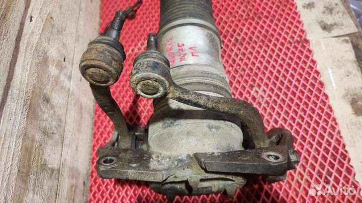 Стойка амортизатора переднего левого Kia Quoris