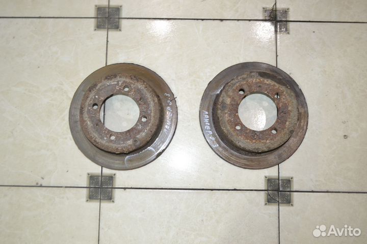 Тормозной диск задний Mitsubishi Lancer 9