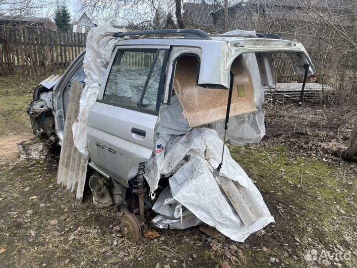 Торпедо панель приборов Mazda Demio пластик