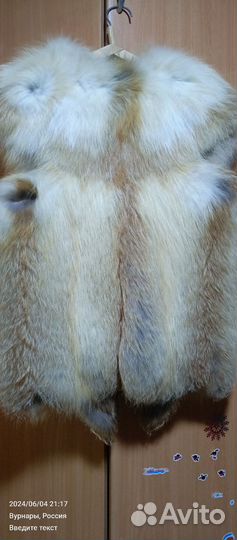 Жилетка меховая женская