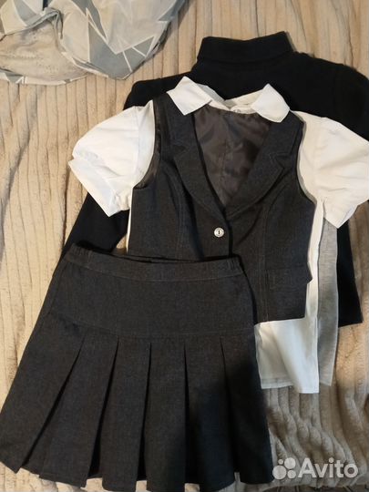 Продам одежду для девочки на 125-130