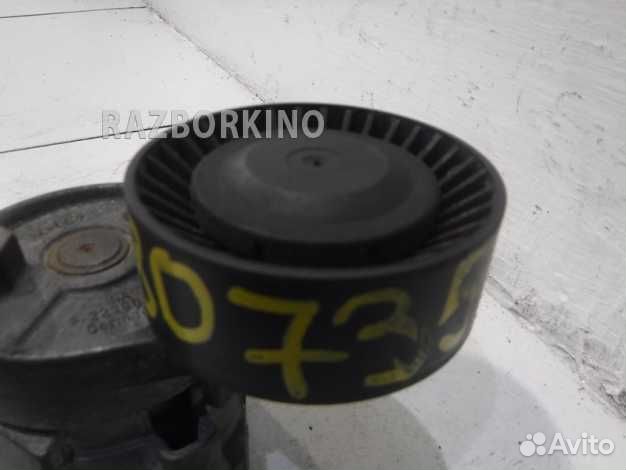 Ролик натяжителя ремня