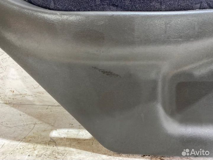 Обшивка боковой двери задняя левая Kia Spectra